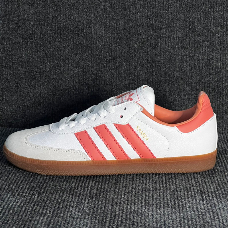 Adidas with pink on sale stripes