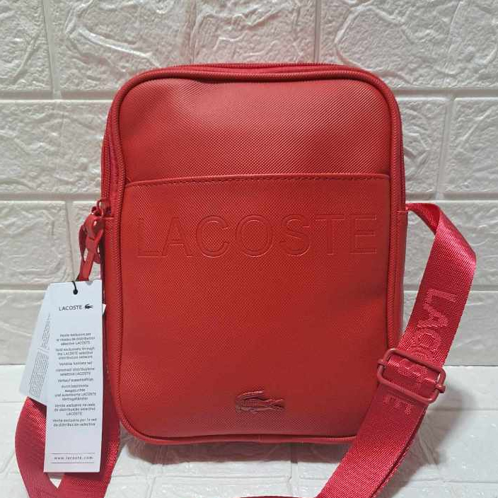 Lacoste red sling bag hotsell