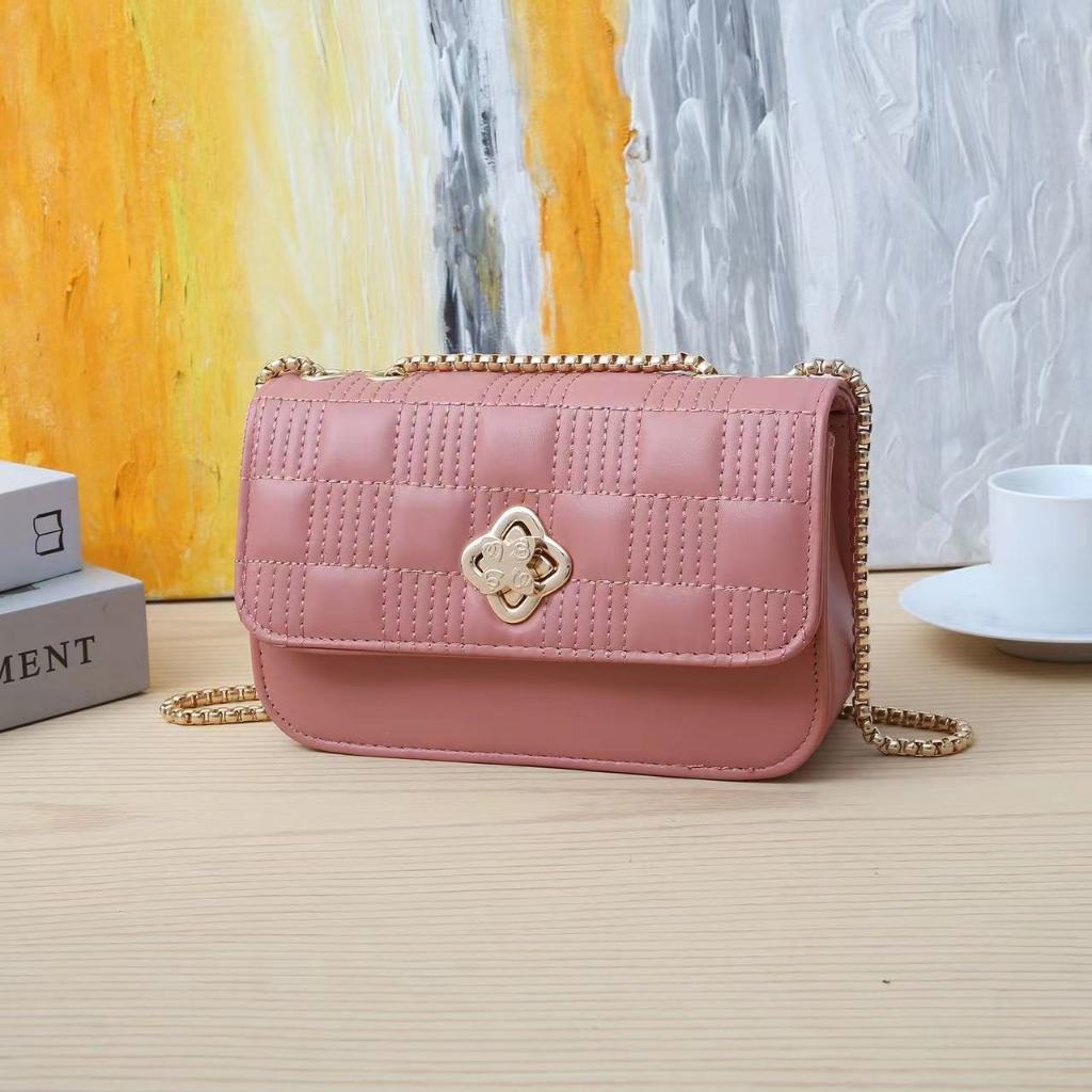 joiea 32029 Women quilted leather chain sling bag twisted lock