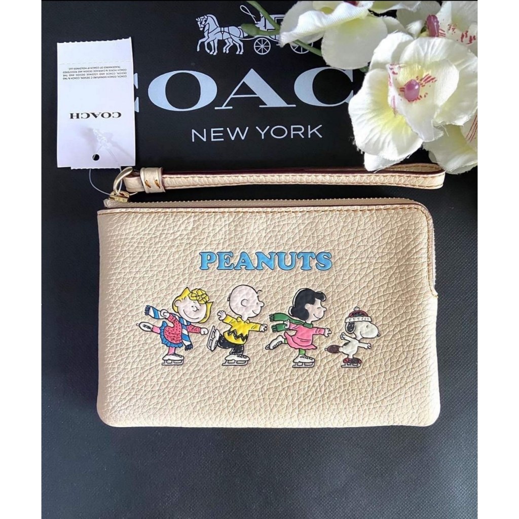 J2FS C.O.A.C.H CF213 C x P.E.A.N.U.T.S Corner Zip Wristlet in Ivory Refined Pebble Leather with Snoo Shopee Philippines