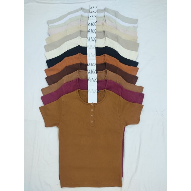 This is a 2/2 Rib cotton premium quality snap button semi tops ...
