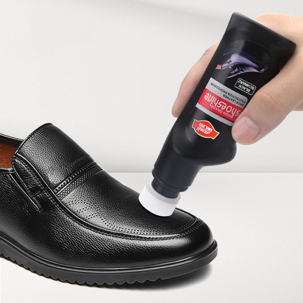 Premium Photo  Shoe cleaning with shoe cream shoe care