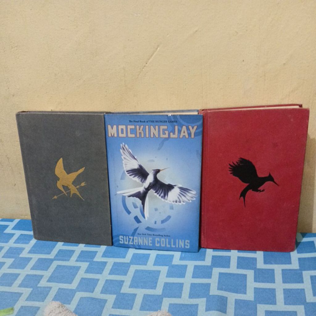the hunger games trilogy hardbound by suzanne collins catching fire ...
