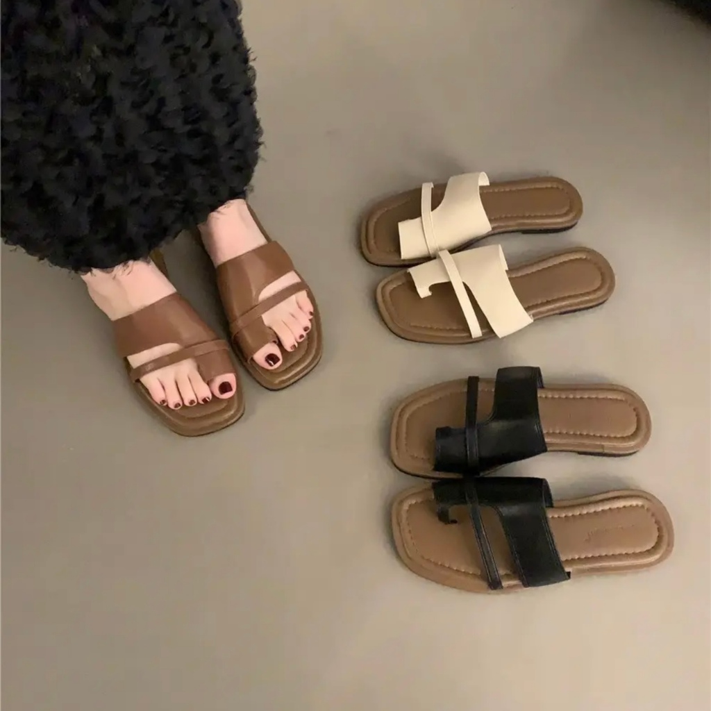Stylish women's slippers. Individualistic French-style Roman flat ...