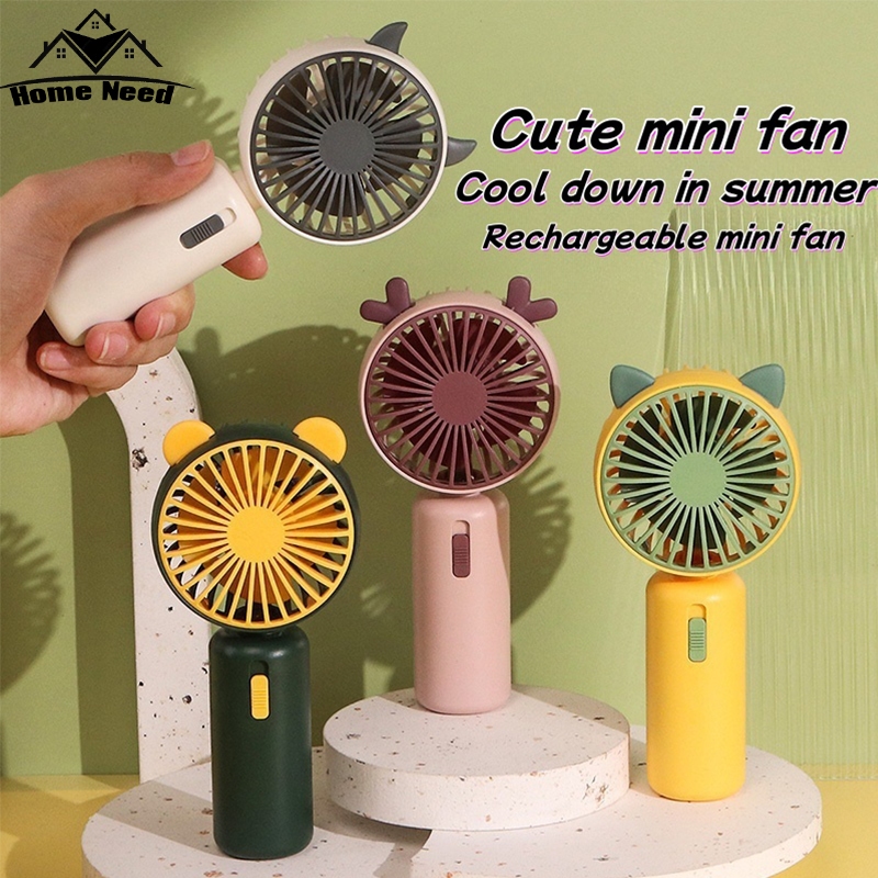 Cartoon charging mini fan, outdoor portable handheld fan, office ...