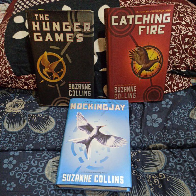 the hunger games trilogy hardbound by suzanne collins catching fire ...