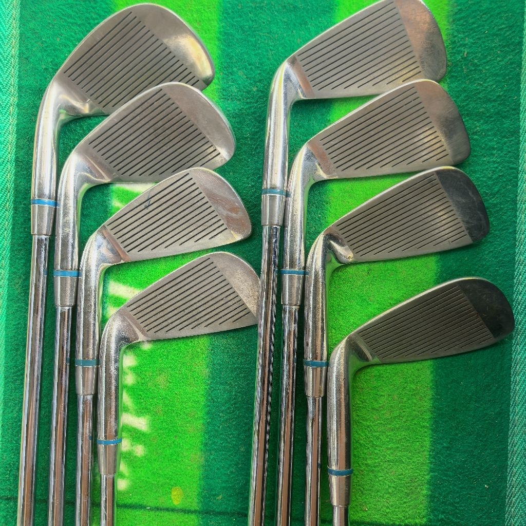 Dunlop Augusta golf irons, specifically numbered 4, 5, 7, 8, 9 