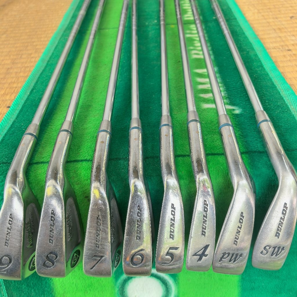 Dunlop Augusta golf irons, specifically numbered 4, 5, 7, 8, 9 