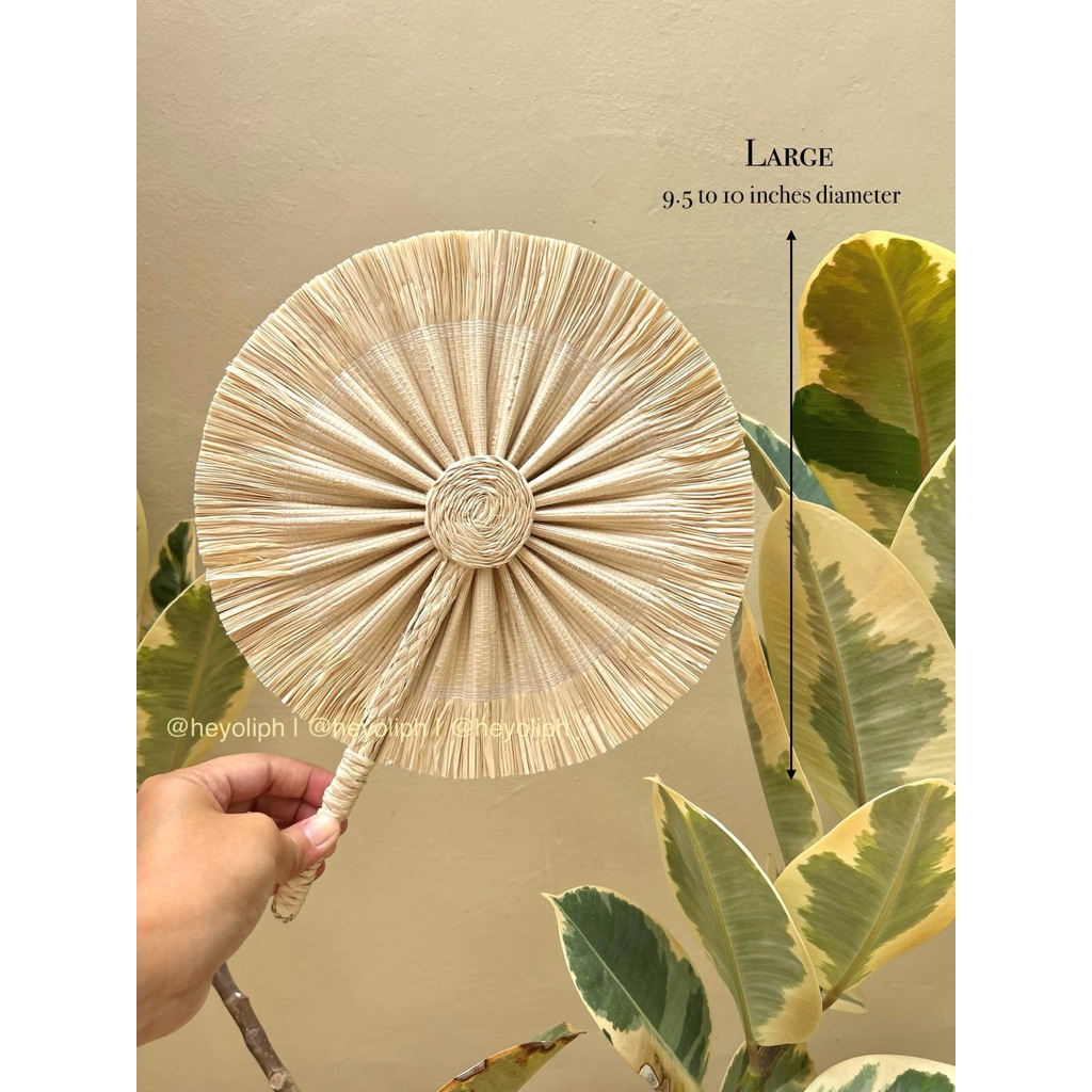 Native fans called Raffia fans for wedding giveaways and other events ...