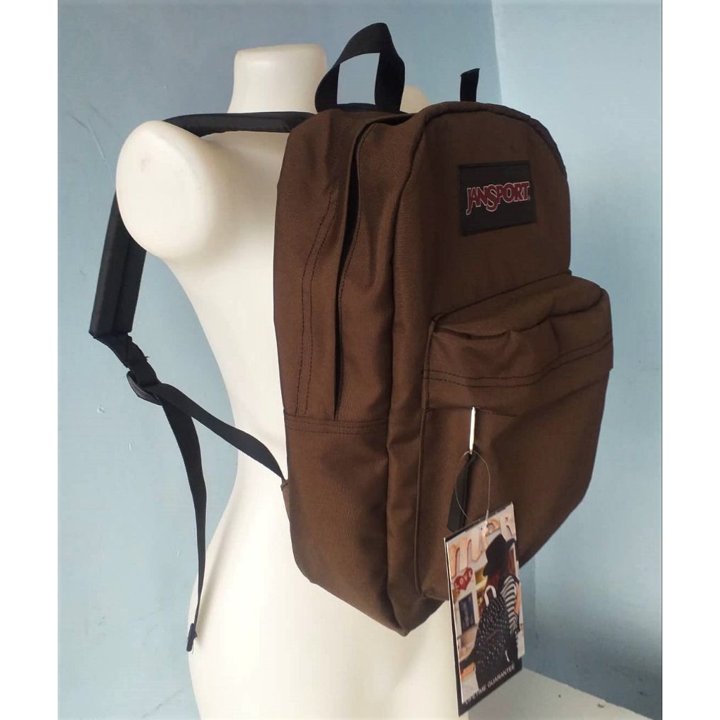jansport backpack dark brown Superbreak Plus The SuperBreak Plus is a fresh take on the classic SuperBreak pack with an internal laptop sleeve and side water bottle pocket JanSport Cool Student 12