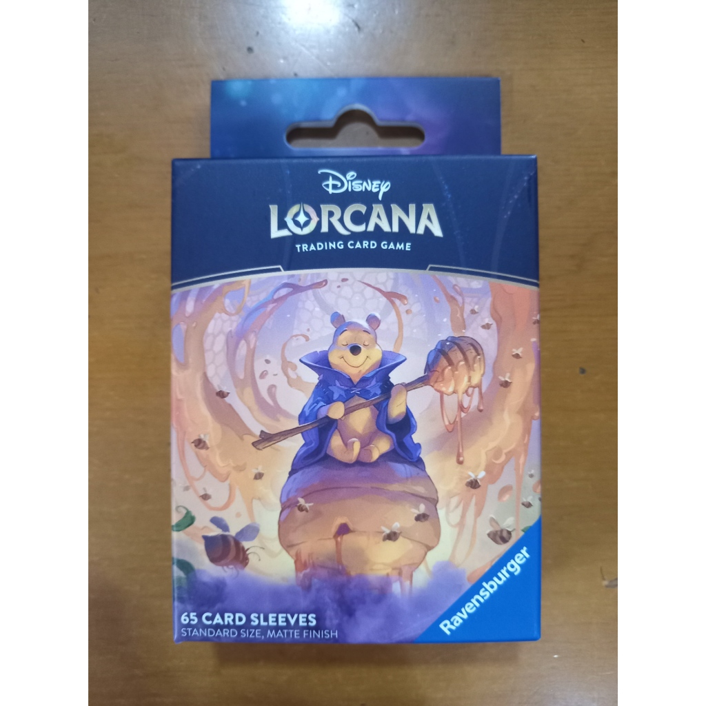 winnie the pooh card sleeves Ravensburger Disney Lorcana TCG Featuring  Hunny Wizard by John Loren | 65 Protective Sleeves for TCG Decks introduces its sixth set Disney Lorcana Winnie the Pooh