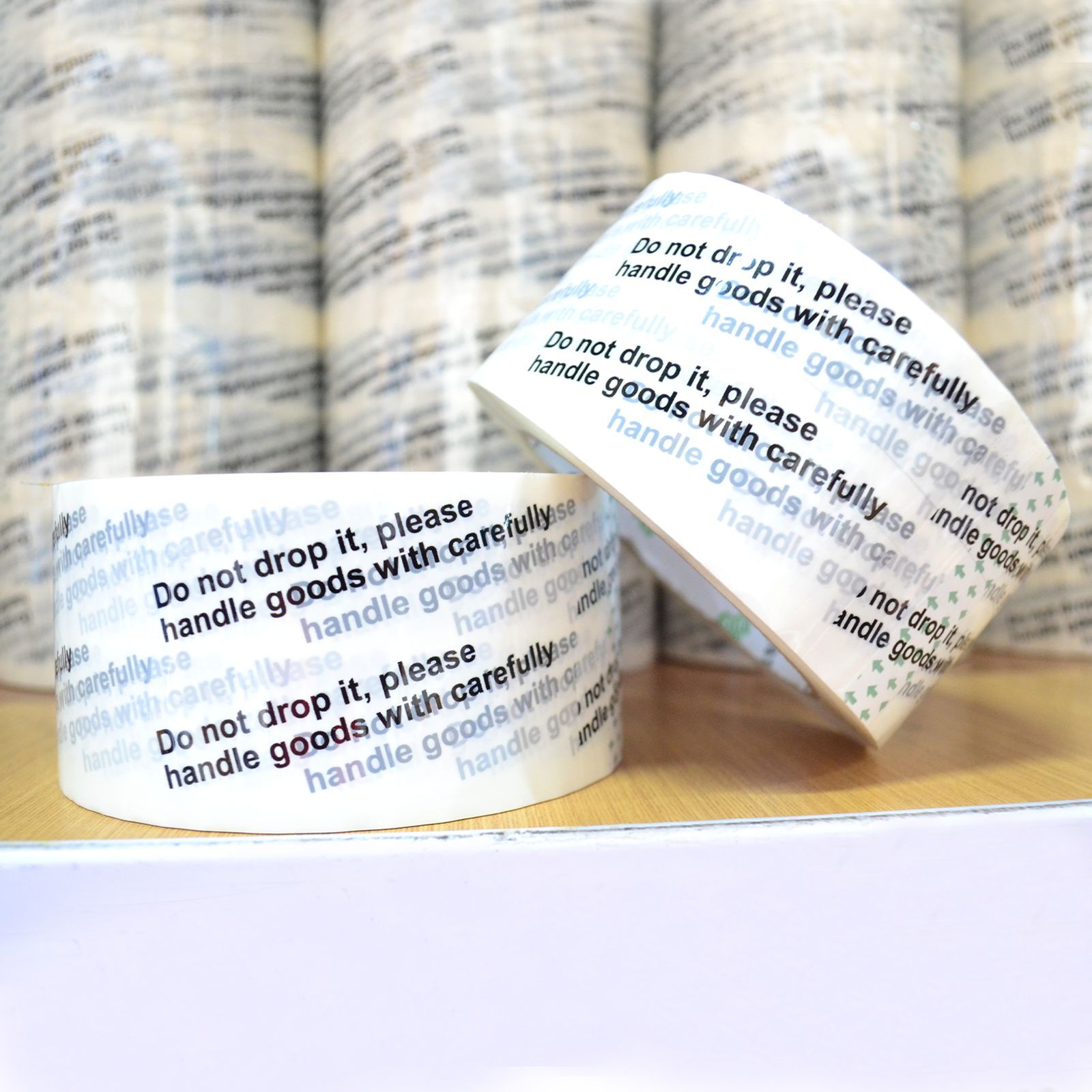 Packing Tape (DO NOT DROP) 100mtrs please handle goods with care ...