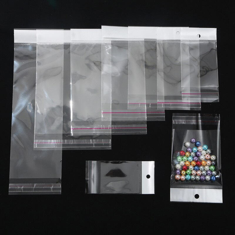 100pcs opp plastic with adhesive and white header hang hole bopp bag ...