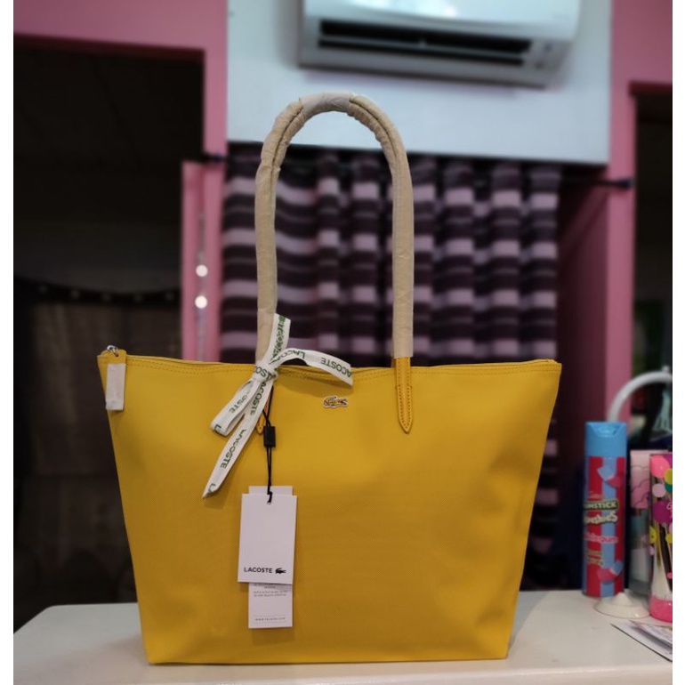 Yellow on sale lacoste bag