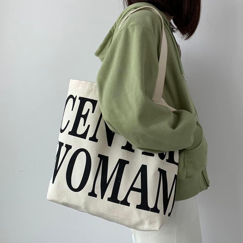 ChristyNg.com - The Vera mini premium canvas tote bag has a sleek minimal  design which can easily be styled with any ensemble including traditional  wear. Style it like @eykafarhana & get your