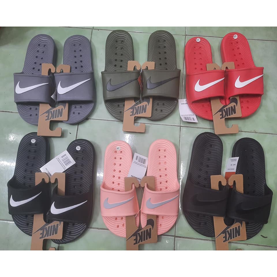 Nike all cheap rubber slides