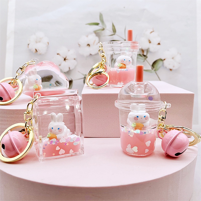 Creative pink oil liquid radish rabbit keychain, delicate doll keychain ...