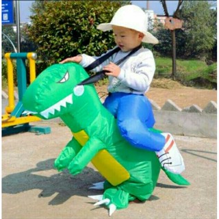 Kid riding a dinosaur on sale costume