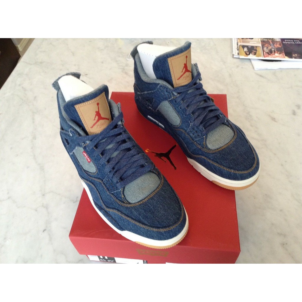 Jordan retro 4 levis precio hot sale