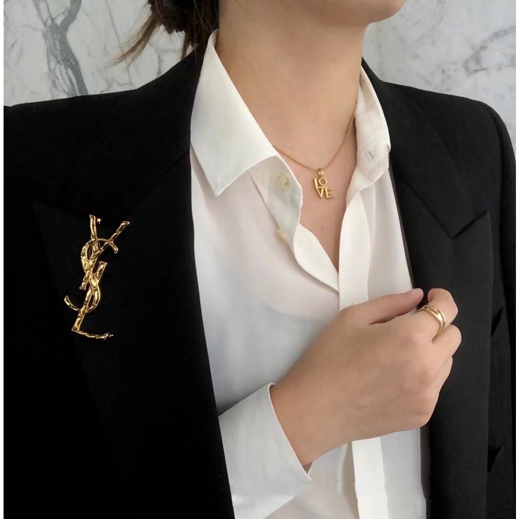 Ysl lapel pin hotsell