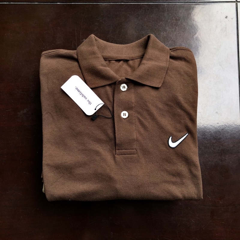 nike polo side swoosh Brown, Men's Fashion, Tops & Sets, Tshirts & Polo  Shirts on Carousell