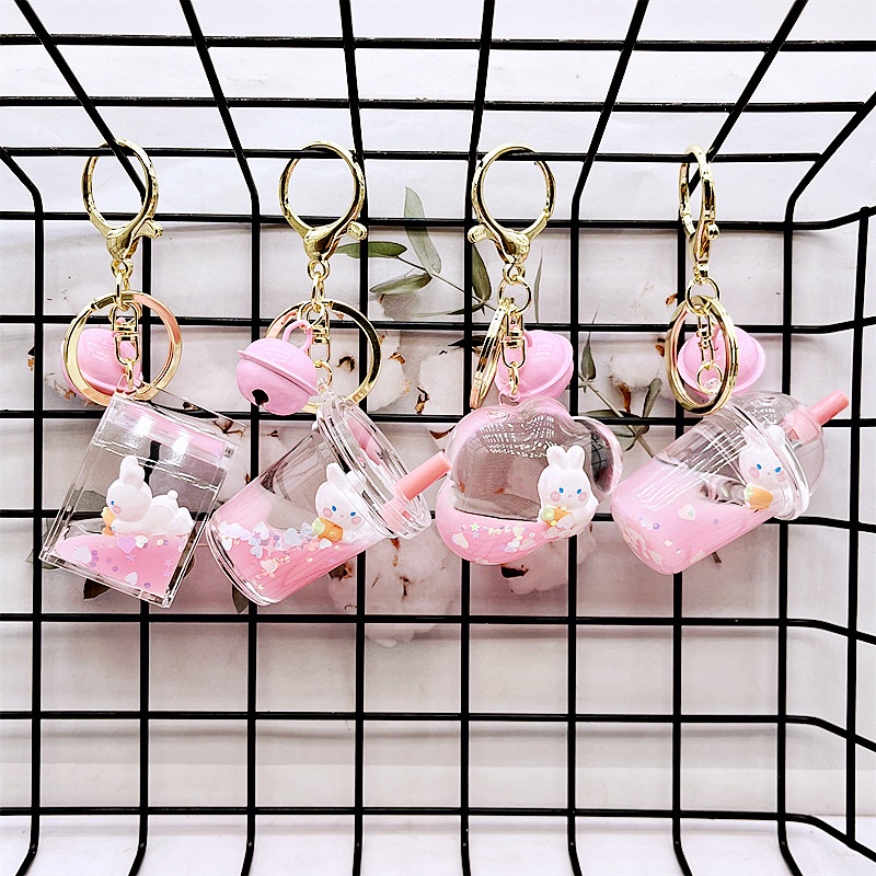 Creative pink oil liquid radish rabbit keychain, delicate doll keychain ...