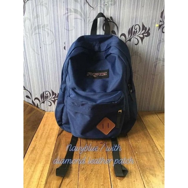 Jansport backpack with outlet patches