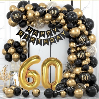 Premium Photo  A black and gold party theme with a black tablecloth and  black and gold balloons.