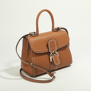 Small Delvaux Pin in cognac colour with white stitching