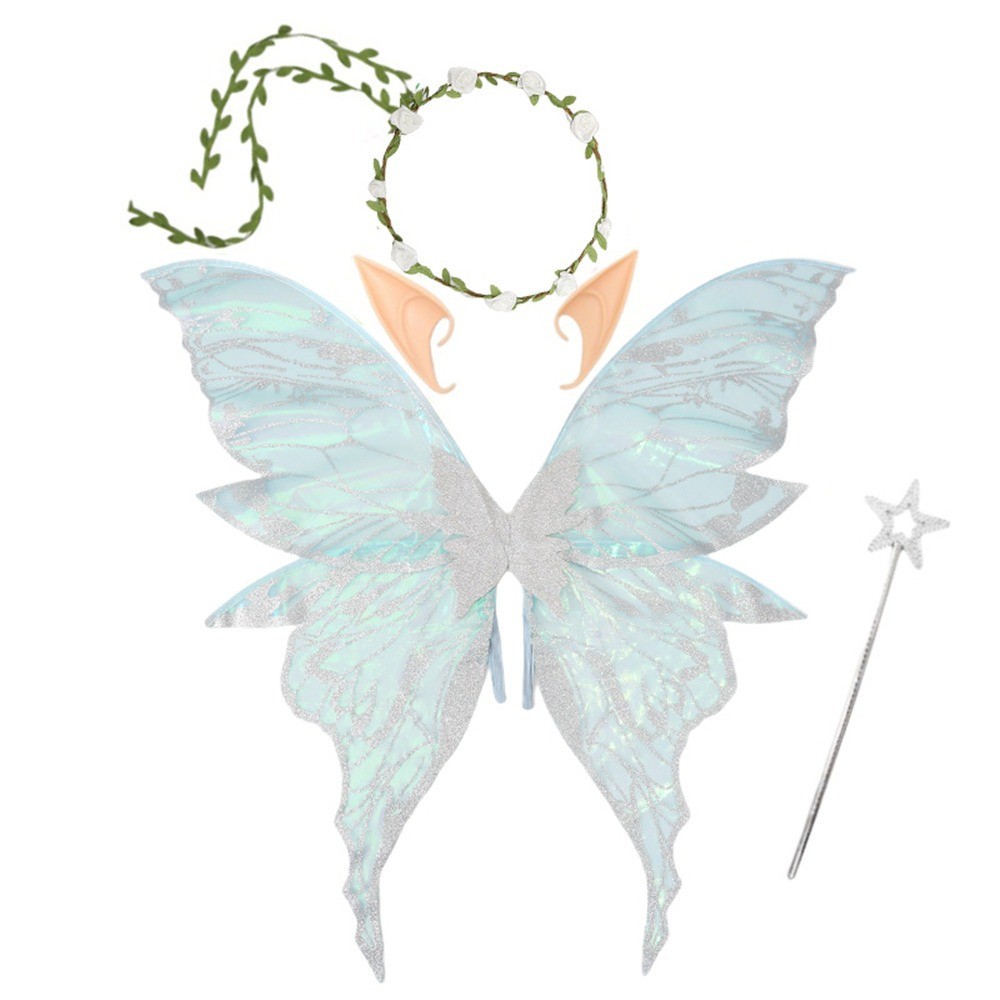 sachin and babi light blue dress cute blonde girl in fairy costume with wings. fairy wings white, made of  transparent chiffon, decorated with pearls. girl stands near old  ivy-covered back. concept of magic and nature 57219627 Stock Photo
