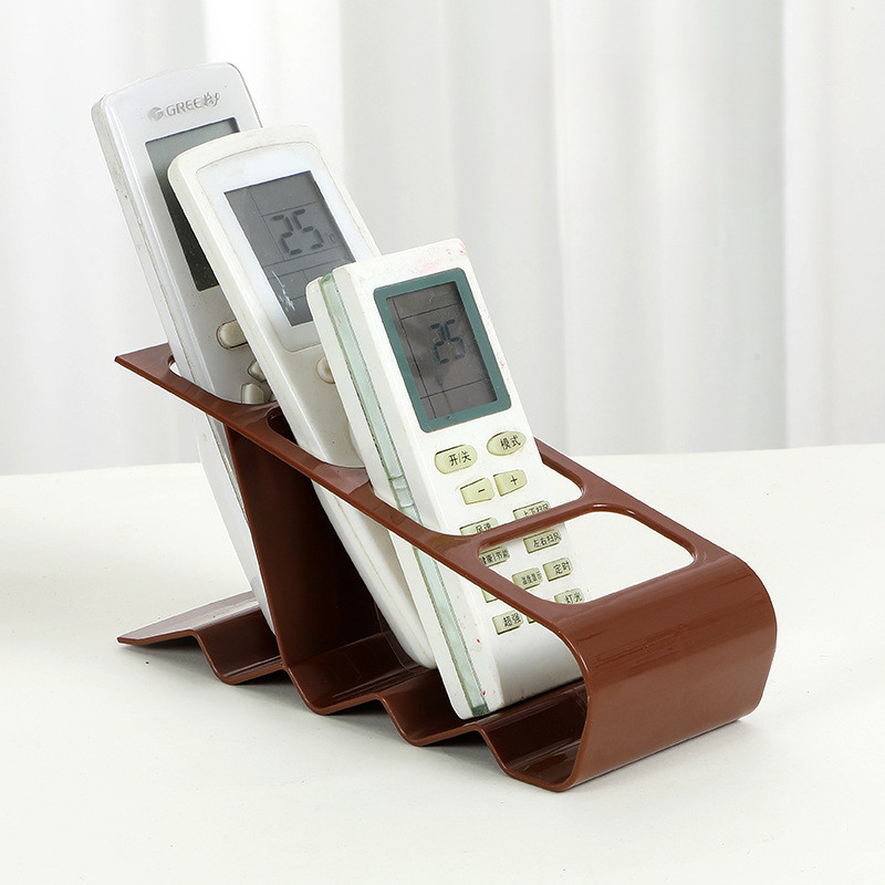 Four-hole air conditioner TV remote control stand storage desktop ...
