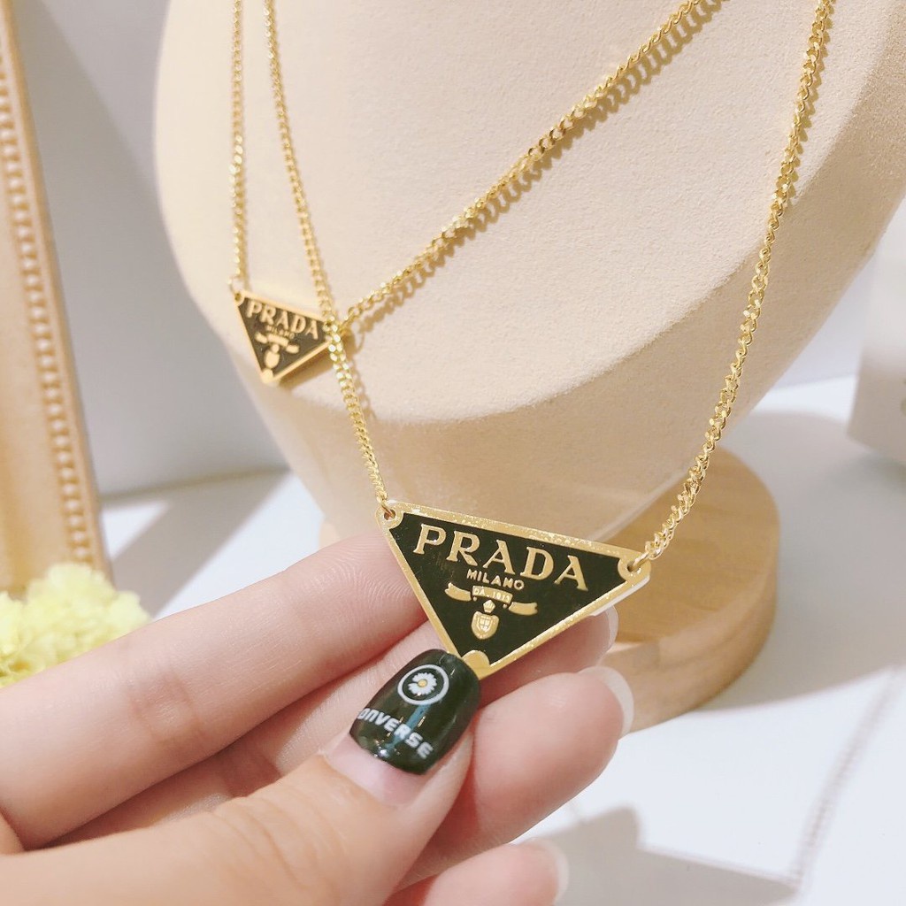 Prada necklace discount triangle gold