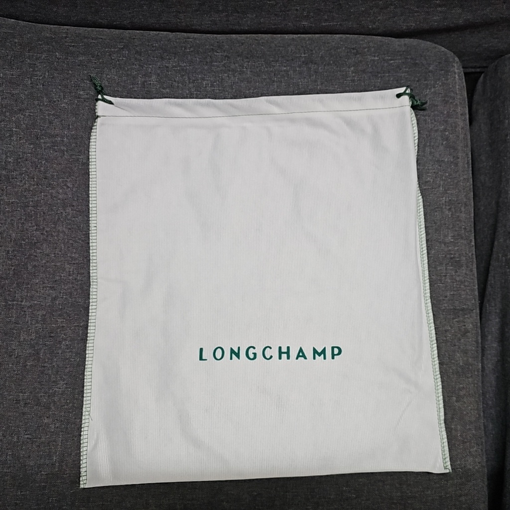 Dust bag longchamp sale