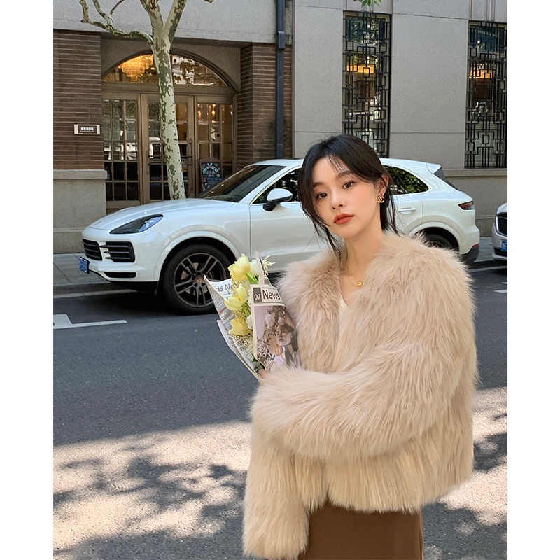 The design feeling hangs neck to expose the collarbone knitting dress female 2023 autumn and winter new style to build the skirt inside