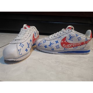 Nike cortez x supreme x best sale louis vuitton