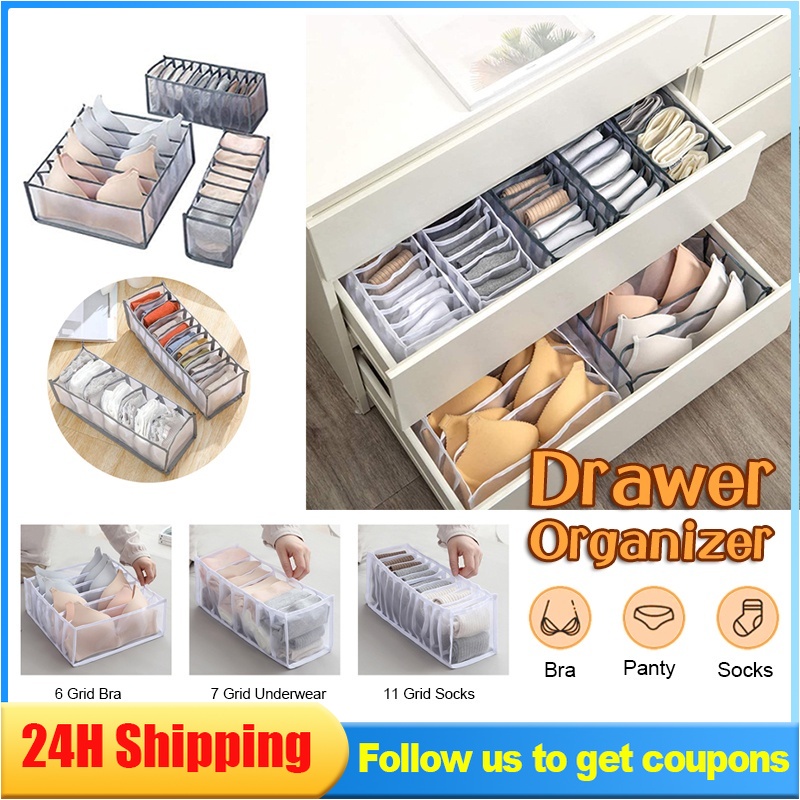 Gray mesh organizer with separate compartments.