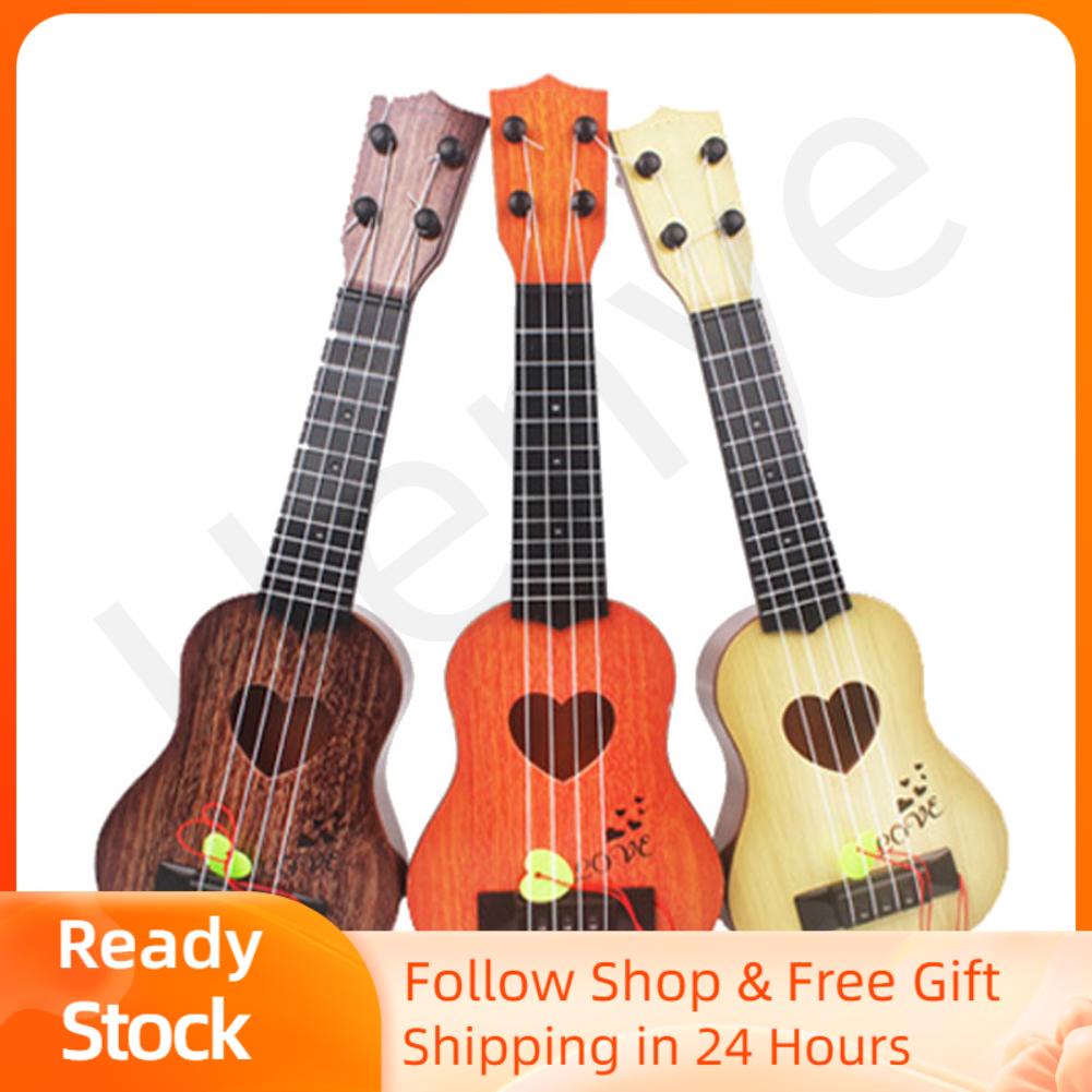 Henye 4 String Kids Ukulele Plastic Toy 35cm Compact Size with Pick for