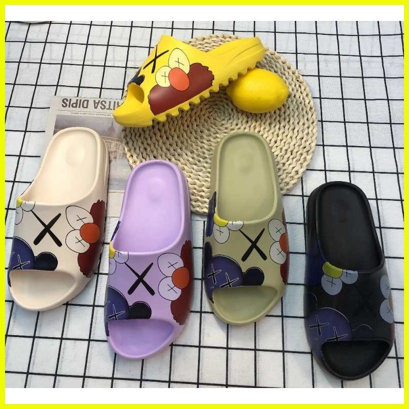 【hot sale】 SlipperBoutique Kanye Yeezy Slides x Kaws Cartoon Sandals ...