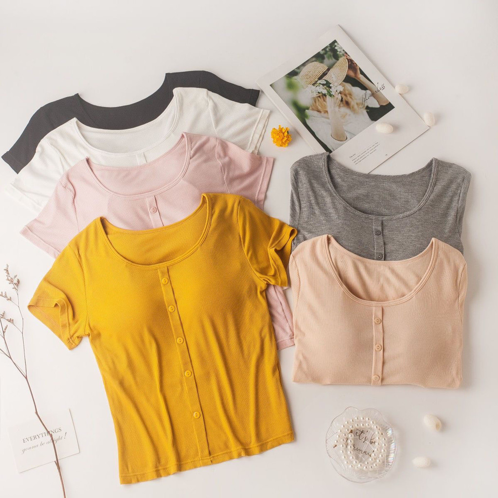 Ribbed women's short sleeve tops displayed in multiple neutral and colorful shades