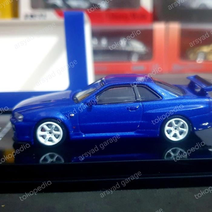 Xe Mô Hình Nissan Skyline GT-R (R34) V-Spec II Bayside Blue 1:64 MiniG