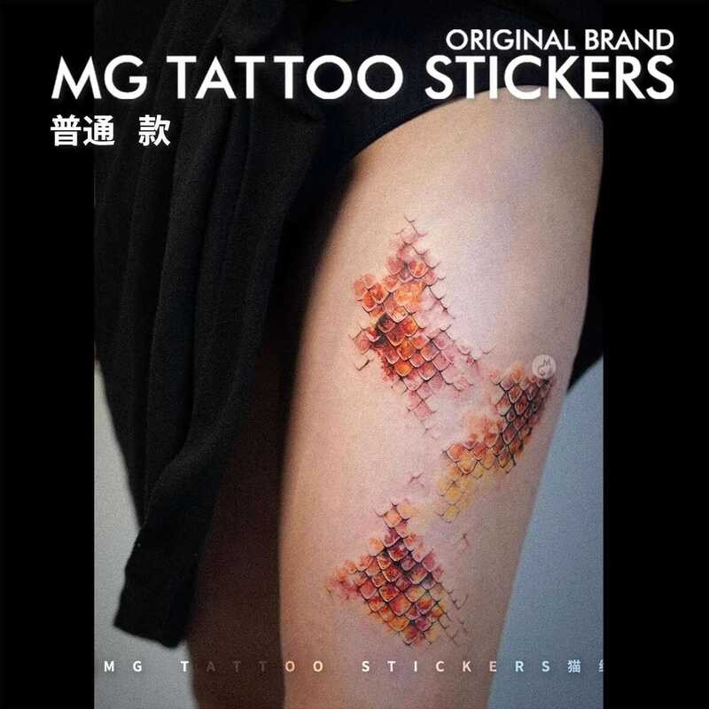 MG Tattoo Radiant Light Saint Python Partial Scale Element Tattoo Thigh ...