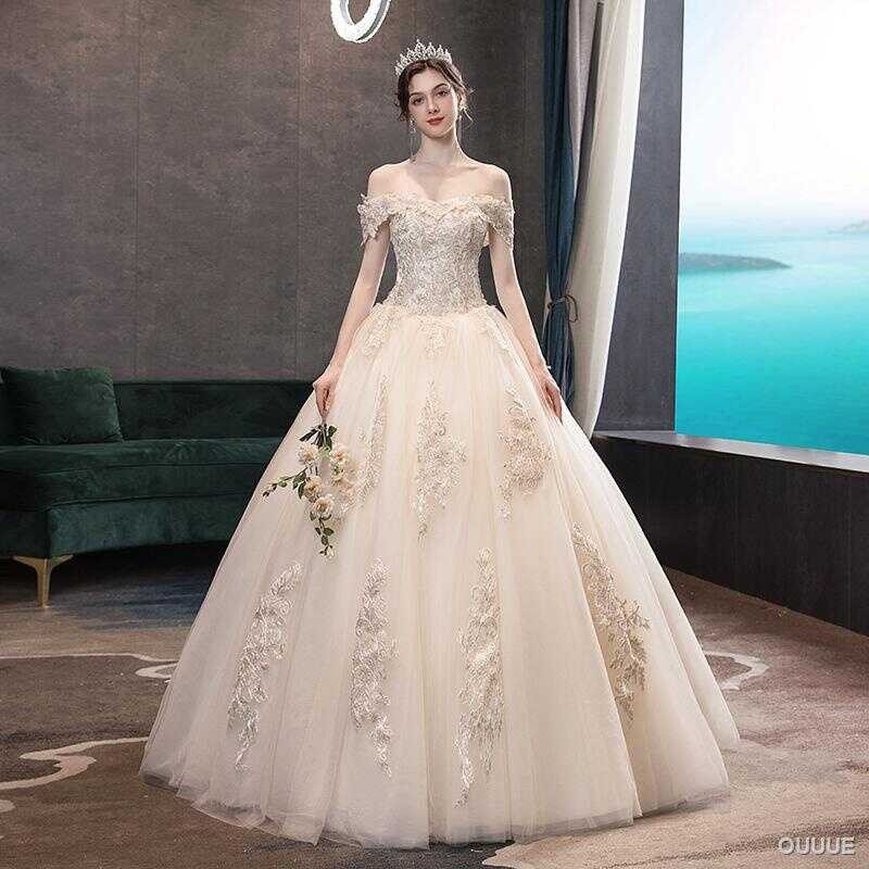 Niulatu Gentle Sheath Round Neck Light Champagne Satin Prom Dress Wedding Guest Dress HZ0113 main image 0