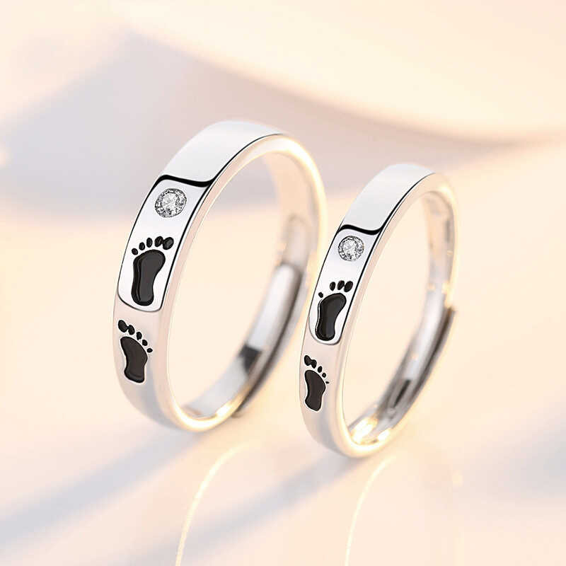 Sterg A Ღ Pair Sier Couple Rings Footprints Of CZ Dia High Polish ...