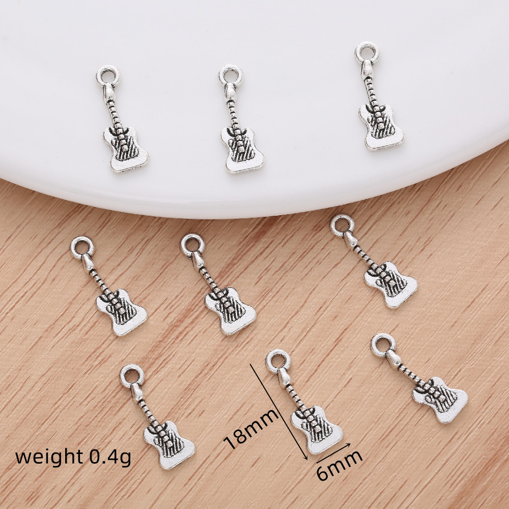 50pcs Exquisite Vintage Guitar Charm Dangles for Women's Fashion