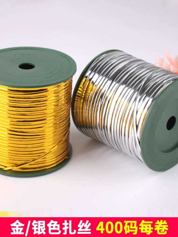 Sealing golden packaging, gold and silver sealing bread gift, tying ...