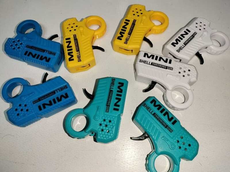 Mini Shell Throwing Gun Fidget Toys 7X6cm With Spark Ce9 | Shopee ...