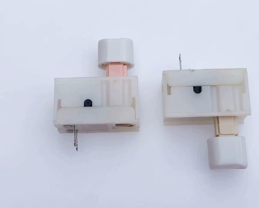 A new shaped button with a white button and a 3-foot white button with ...