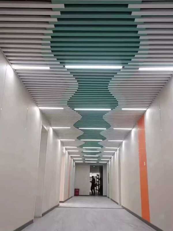 Curved ceiling with irregular tree wave shaped wood grain, veneer, bent ...