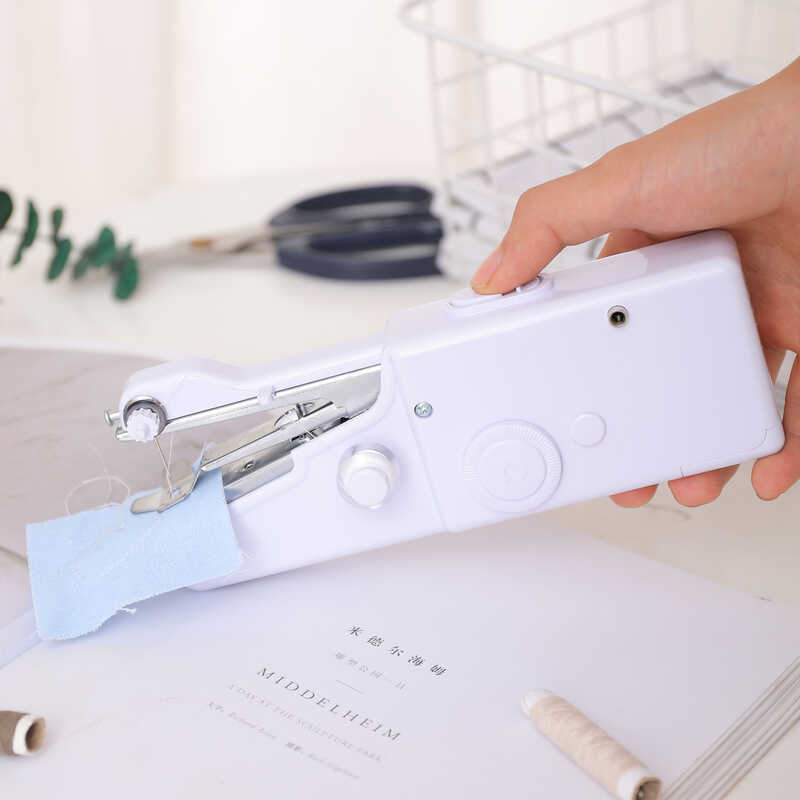 Handheld Portable Handy Stitch 101 Mini Electric Sewing Machine 340G ...