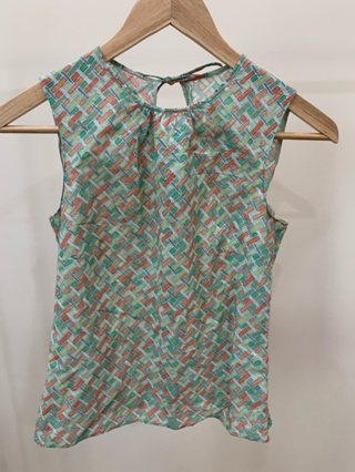 Green Sleeveless Shirt Printed Pattern With A Bow Tie Back Zip ...